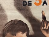 a poster of a young boy pointing at something