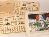 several books with illustrations of soldiers on them sitting on a table