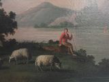 a painting of a man sitting on a hill with a flock of sheep