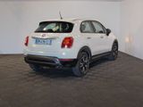 a white car that is parked in a room