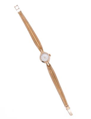 a close up of a wrist watch on a white background