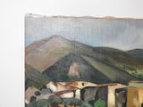 a painting on the wall of a building with a mountain in the background