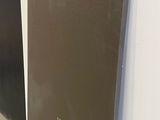 two black and white doors next to a white wall