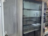 an image of a commercial kitchen with stainless steel appliances