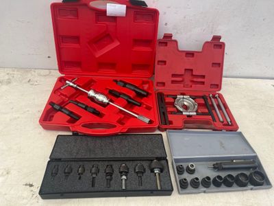 a red case with tools in it on a table