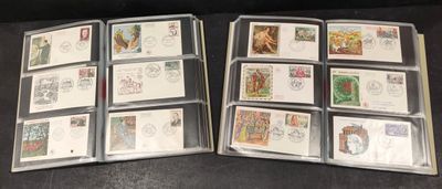 several different types of stamps are in a folder on a table