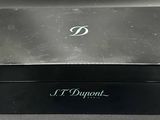 a black box with a logo on it sitting on a table