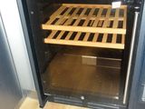 an image of a wine rack in a small oven