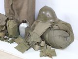 a lot of military items that are on a table