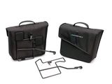 two pieces of luggage sitting next to each other on a white surface