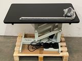 an image of a black and white computer desk on a pallet