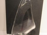 a glass sculpture of a sailboat on display in a glass case