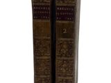 pair of antique books on a white background with a white background