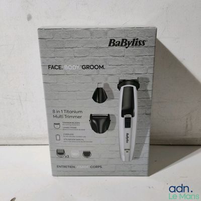 une photo en noir et blanc d'une tondeuse à cheveux Babyliss