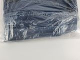 a close up of a plastic bag on a white surface