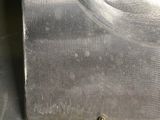 a piece of metal with a hole in the middle of it