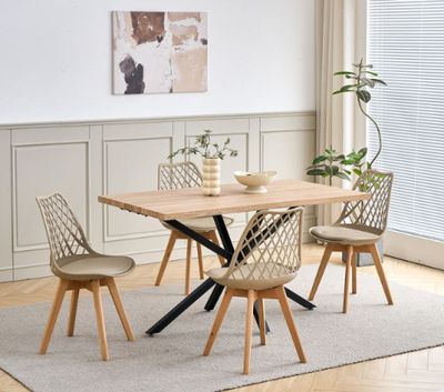 a wooden table with four chairs and a vase on top of it