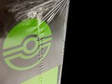 a close up of a box with a green logo on it