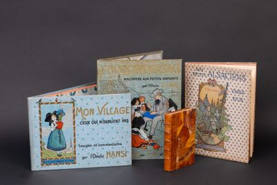 trois livres pour enfants empilés les uns sur les autres