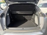 a trunk of a car with its trunk open in a parking lot