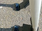 a close up view of a pair of black wheels on a skateboard
