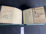 an open book with a stamp on it sitting on top of a table
