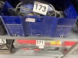 a blue box with a number on it sitting on a shelf