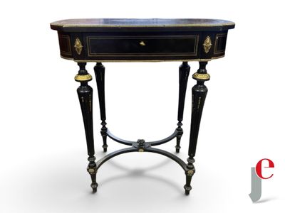 a black table with a drawer on top of it