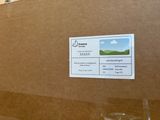 a box of wine sitting on a table with a label on it