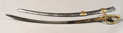 two swords that are sitting next to each other on a table
