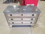 an image of a silver dresser with marble top