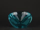 an image of a blue glass vase sitting on top of a table