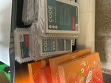 a pile of boxes and packages on a table