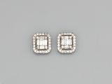 a pair of diamond earrings