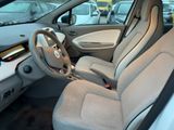 a view of a car ' s interior from the driver ' s seat