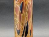 an image of a glass vase on a gray surface