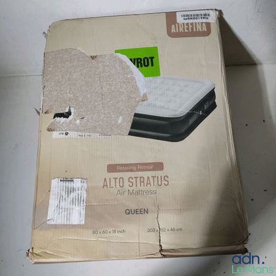 packaging of a mattress in a cardboard box on a table