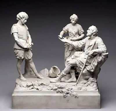 une photo représentant une statue d'un groupe de personnes assises sur un banc