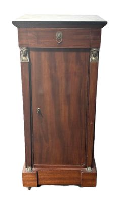 an image of a wooden cabinet with a marble top