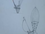 drawing of a light bulb and a lamp on a white paper