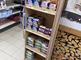 a store with shelves full of food and drinks in it