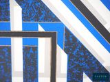 a picture of a blue and white wall with a black and white pattern on it
