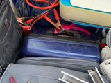 many pieces of luggage that are packed together on the floor