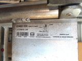 a label on the back of a machine that is sitting on the floor