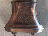 a bell hanging from the wall on the wall