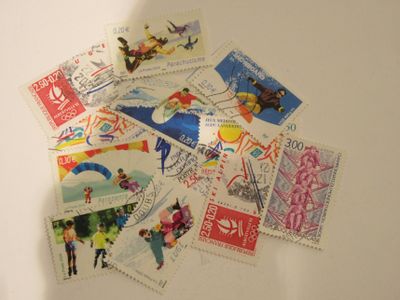 a lot of stamps that are on the table