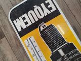 a yellow and black sign on the floor that says eadonn