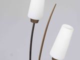 three lamps that are sitting on a table
