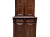 an old wooden cabinet with two doors and two drawers