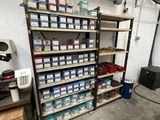 a room with a lot of items on the shelves
